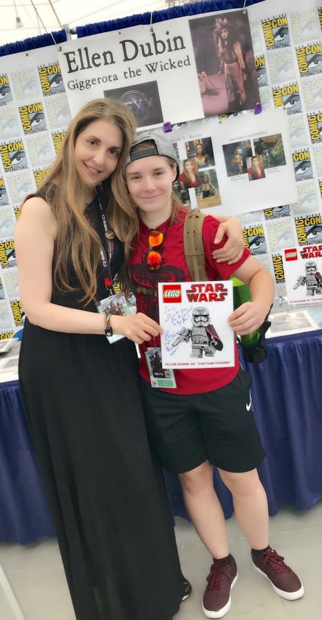 Ellen and a wonderful fan buying the first picture of Ellen as Captain Phasma in Lego:Star Wars