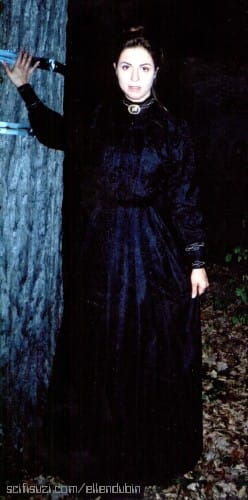 Ellen as Cockney housekeeper Olive Foy in full wardrobe
