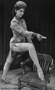 This photo is ELLEN as the femme fatale (spoofing all those sexy dames from the 1940's film noire genre) in the comedy THE MALTESE BLUE JAY. The musical director even gave her a special drum roll every time she entered. A "classic sexy comic" performance said the reviewers.