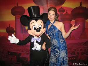 Ellen poses with Mickey Mouse at the Make-A-Wish® Gala